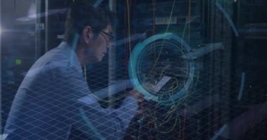 Animation of data processing over asian male worker in server room. Computer security day and celebration concept digitally generated video.