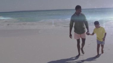 Afrika kökenli Amerikalı bir adam ve oğlunun kumsalda yürüdüğü animasyonlar. Yaşam tarzı, aile ve ışık konsepti dijital olarak oluşturulmuş video.