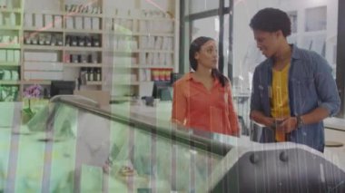 Animation of financial data processing over business people working in office. Global business data processing and technology concept digitally generated video.