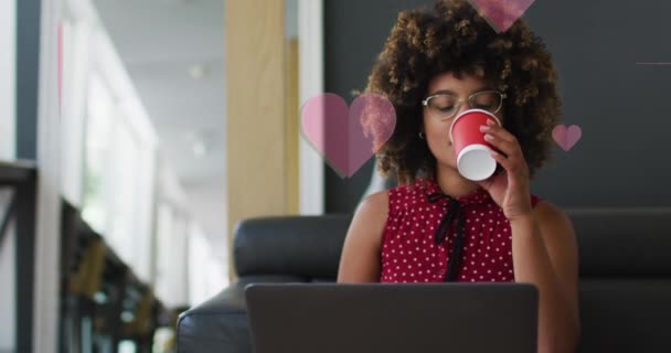 Animation Pink Hearts Biracial Businesswoman Using Laptop Global Social Media — Video