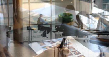 Animation of hands of caucasian female designer over diverse businesspeople. Business, working in office and technology concept digitally generated video.
