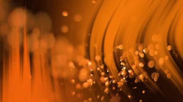 Animation Glowing Orange Particles Falling Orange Light Moving Black Background — Stok video