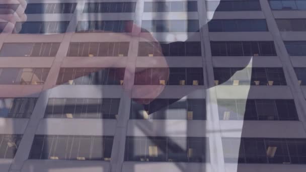 Composite Video Mid Section Businessman Businesswoman Shaking Hands Tall Buildings — Αρχείο Βίντεο
