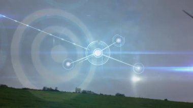 Animation of network of connections with spots over wind turbine. Global environment, green energy and connections concept digitally generated video.