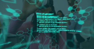 Animation of scientific data over biracial woman wearing vr headset in office. business, science and working with technology concept digitally generated video.