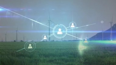 Rüzgâr türbinlerinin üzerindeki insan simgeleriyle bağlantı ağının animasyonu. Küresel çevre, yeşil enerji ve bağlantılar dijital olarak oluşturulmuş video konsepti.