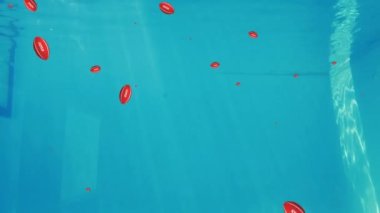 Animation of balls with japan over swimmer jumping into pool. Sport, active lifestyle and competition concept digitally generated video.