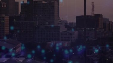 Animation of network of connections with falling dots over cityscape. Global network, connections, communication and technology concept digitally generated video.