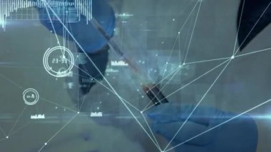 Network of connections over mid section of scientist holding test-tube at laboratory. Medical research and science technology concept