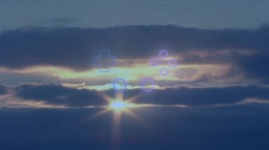 Animation of gaming pad over sunset. global network, data processing and technology concept digitally generated video.