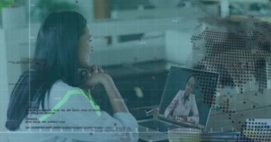 Animation of graphs and globe over biracial woman having video call on laptop. Network, communication, finance and technology concept digitally generated video.