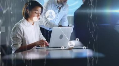 Animation of network of connections with icons over caucasian over caucasian woman using smartphone. Global business digital interface technology and networking concept digitally generated image.