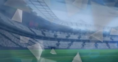 Futbol stadyumunun üzerinde sönen şekillerin ve parlayan ışıkların animasyonu. Dünya kupası konsepti dijital olarak üretilen video.