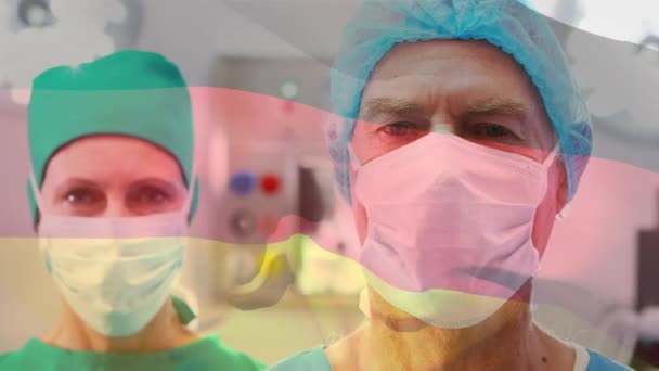 Animasi Bendera Germany Atas Dokter Perempuan Dan Laki Laki Kaukasia — Stok Video