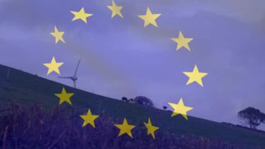 Erupean Birliği bayrağının rüzgâr türbini üzerindeki animasyonu. Çevre gücü, yeşil enerji ve eu politika kavramı dijital olarak oluşturulmuş video.