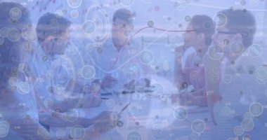 Network of digital icons and data processing over diverse businesspeople discussing at office. Global finance and business technology concept