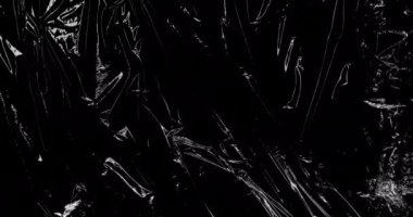 Siyah arkaplanda hareket eden şekillerin animasyonu. Soyut arkaplan ve hareket dokularını dijital olarak oluşturulmuş video konsepti.