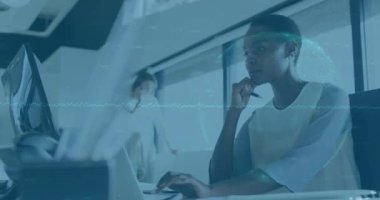 Animation of data processing over african american woman in office. Business, finance, economy, data processing and technology concept digitally generated video.