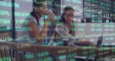 Animation of financial data and graphs over diverse female coworkers in office. Business, finance, economy, cooperation and communication concept digitally generated video.