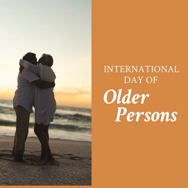 Image International Day Older Persons Senior Biracial Couple Embracing Beach — Stock Photo, Image