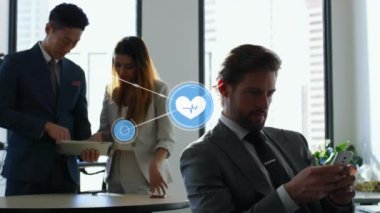 Animation of network of connections over diverse businesspeople in office. Global network, connections, communication and business concept digitally generated video.