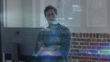 Animation of data processing over caucasian man in office. Business, data processing and technology concept digitally generated video.