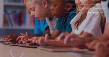 Animation of graphs and financial data over diverse pupils using tablets in classroom. School, education, learning with technology and finance concept digitally generated video.