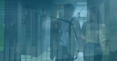 Animation of financial data processing and wind turbine over diverse business people. Global business, computing and digital interface concept digitally generated video.