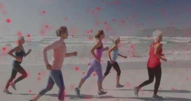 Animation of spinning dna strand over caucasian senior group of woman running on the beach. International day of older persons concept digitally generated video.