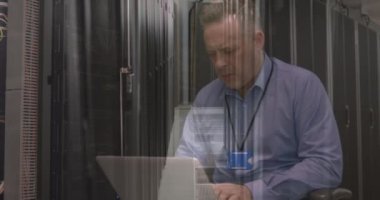 Animation of data processing over caucasian server room worker. Global connections, data processing and digital interface concept digitally generated video.