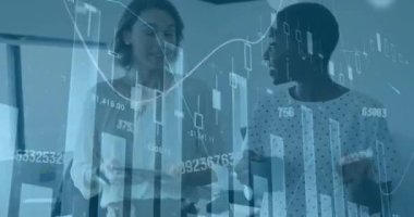 Animation of financial graphs and data over diverse female coworkers in office. Business, finance, economy, data processing and technology concept digitally generated video.