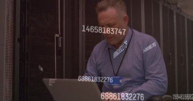 Animation of data processing over caucasian server room worker. Global connections, data processing and digital interface concept digitally generated video.