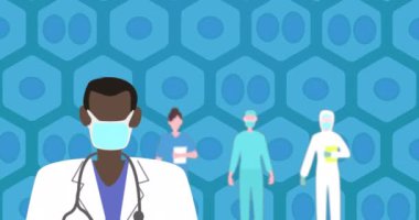 Animation of afrcian american male doctor in face mask over green cells on navy background. Human biology, anatomy and medicine concept digitally generated video.