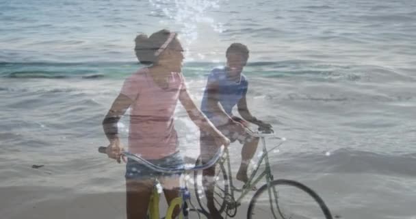 Animation Happy African American Couple Bikes Seascape Holidays Vacations Relax — Stock Video