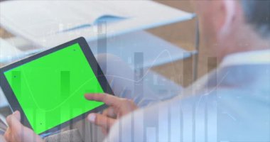 Animation of statistical data processing over caucasian man using digital tablet with copy space. Global networking and business data technology concept