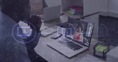 Animation of media icons over diverse business people having video call in office. Global business and digital interface concept digitally generated video.