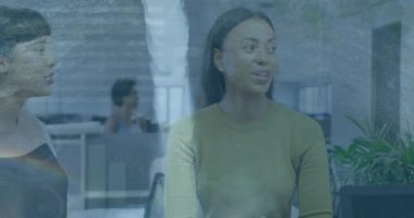 Animation of independence day text over diverse group of senior people digital composition. Global business connections data processing and technology concept digitally generated video.