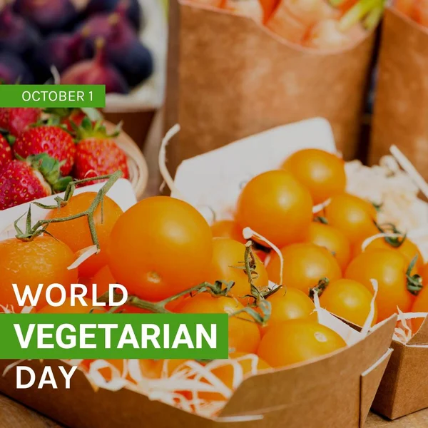 Composition of world vegetarian day text over fruits in boxes. World vegetarian day and celebration concept digitally generated image.