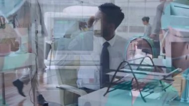 Animation of walking people over surgeons in operating theatre. Healthcare services concept digitally generated video.
