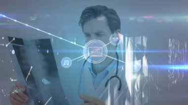 Animation of network of connections with icons over caucasian male doctor. Global medicine, connections and digital interface concept digitally generated video.