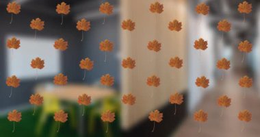 Animation of fall leaves moving over blurred restaurant. Colour, shape, patters and movement concept digitally generated video.