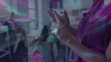 Animation of connections over midsection of caucasian female teacher and class of diverse pupils. School, education, learning and connections concept digitally generated video.