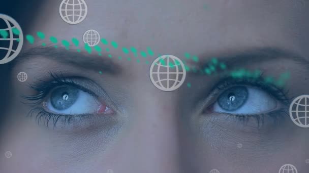 Animation Data Processing Multiple Globe Icons Floating Close Female Eyes — Video