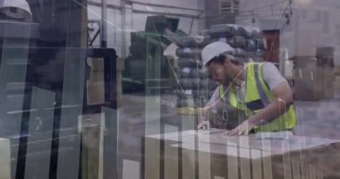 Animation of statistical data processing over caucasian male worker packing boxes at warehouse. Logistics business and technology concept