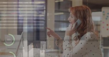 Animation of data processing over caucasian businesswoman talking on phone. Global business and digital interface concept digitally generated video.
