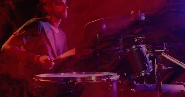 Animation Glowing Red Lights Mid Section Caucasian Man Playing Drums — Vídeos de Stock
