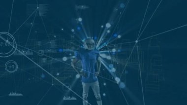 Animation of data processing and digital city over caucasian rugby player. Global business and digital interface concept digitally generated video.