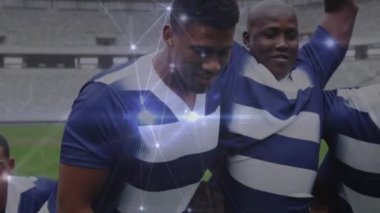Animation of network of connections over team of diverse male rugby players defending together. Global networking and sports technology concept