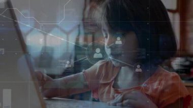 Animation of network of connections with icons over biracial schoolgirl using laptop. Global education, connections and digital interface concept digitally generated video.