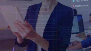 Animation of financial data processing over caucasian woman using tablet. Global business, finances and data processing concept digitally generated video.